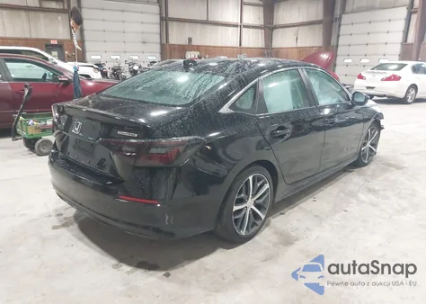 2022 Honda Civic Touring z USA, uszkodzony, nr VIN 2HGFE1F99NH302740